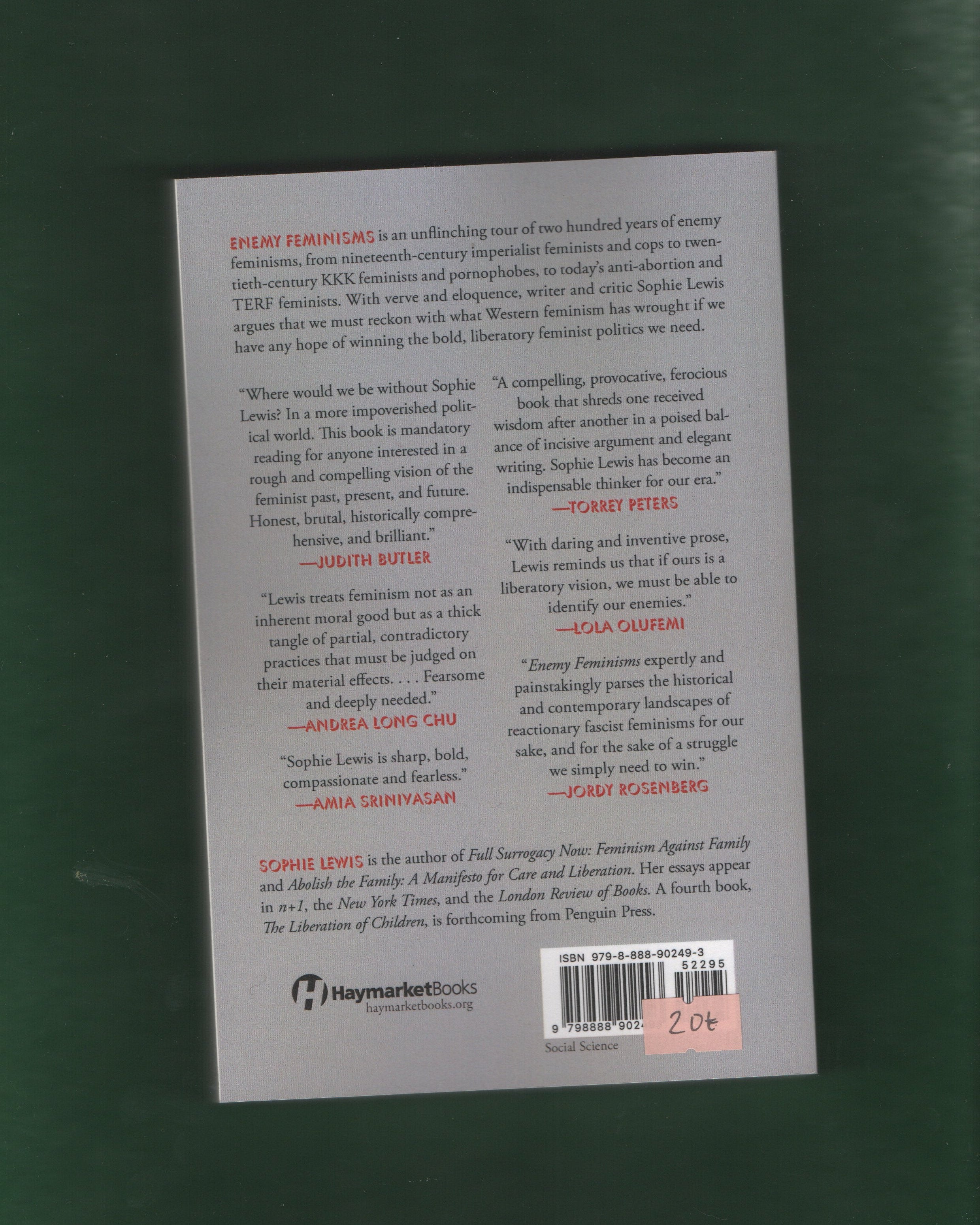 Back cover of a book with text and a barcode on a green background
