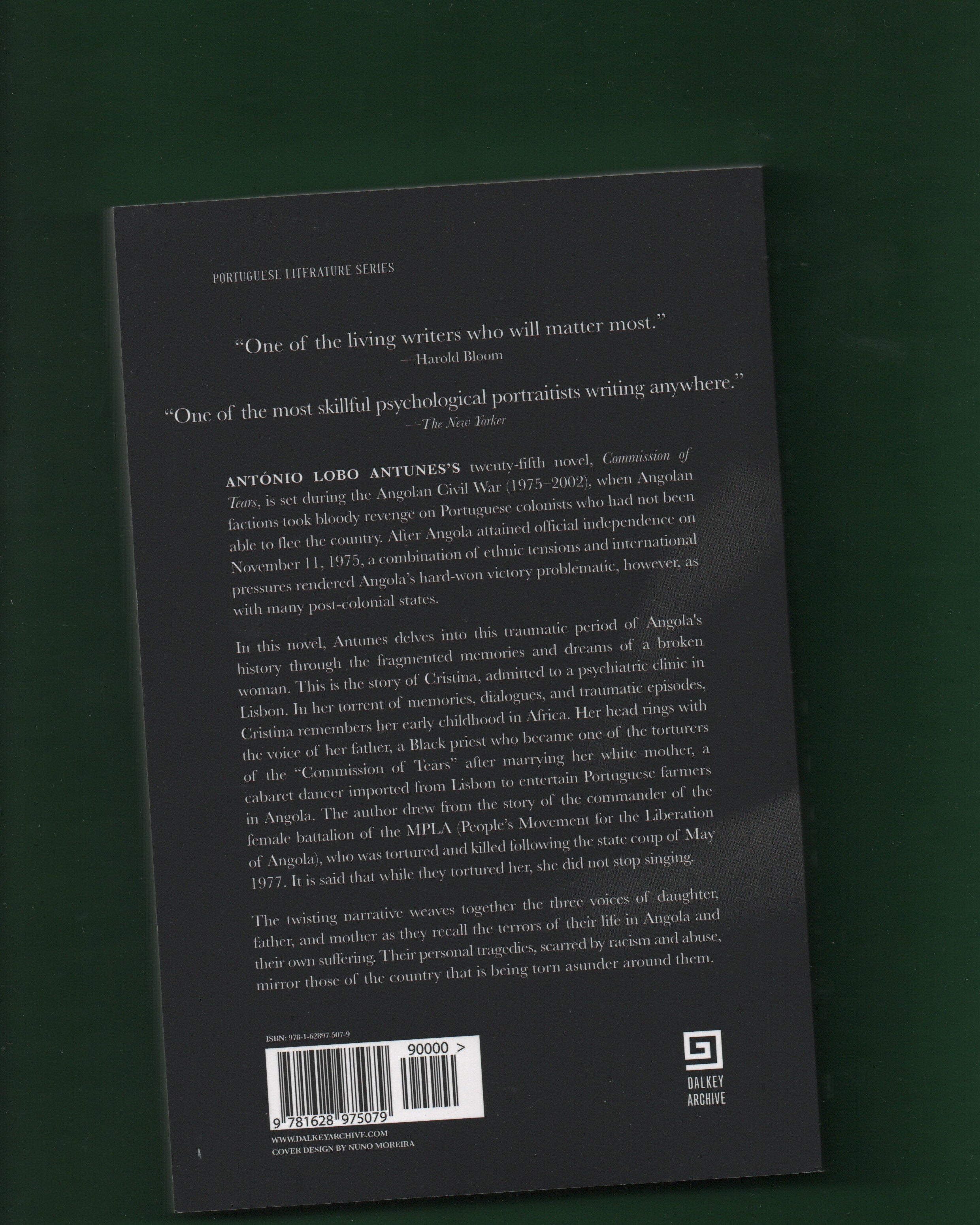 Book back cover with text and a barcode on a dark background